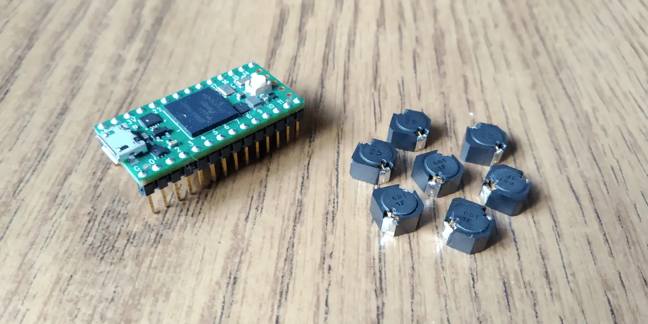 The Teensy 4.0 microcontroller along the Inductors used for this project